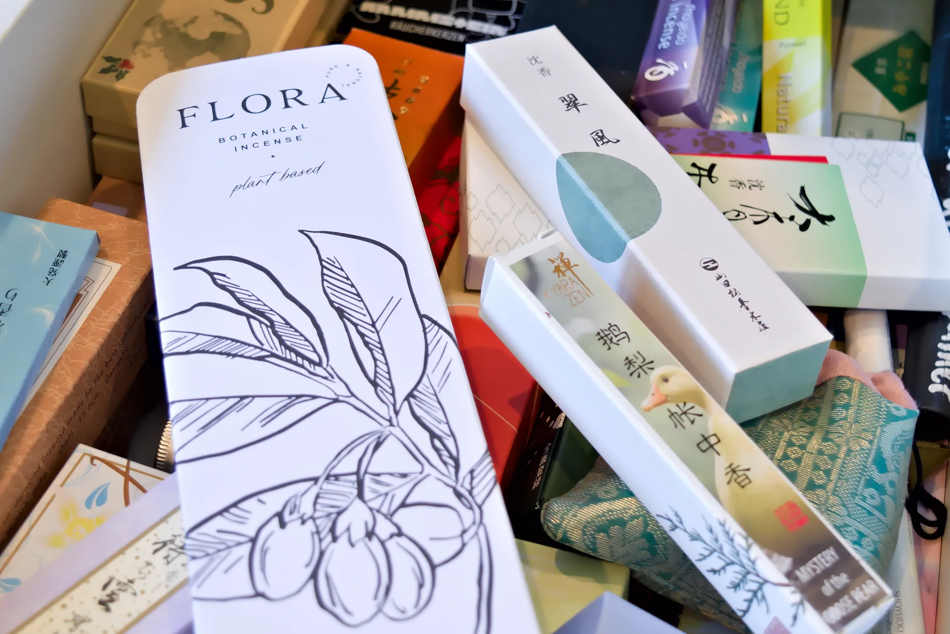 The large package of incense sticks situated in a drawer full of much smaller boxes of Japanese incense. To the right are Kyara Zen's Mystery of the Goose Pear, and Yamadamatsu's Suifu.